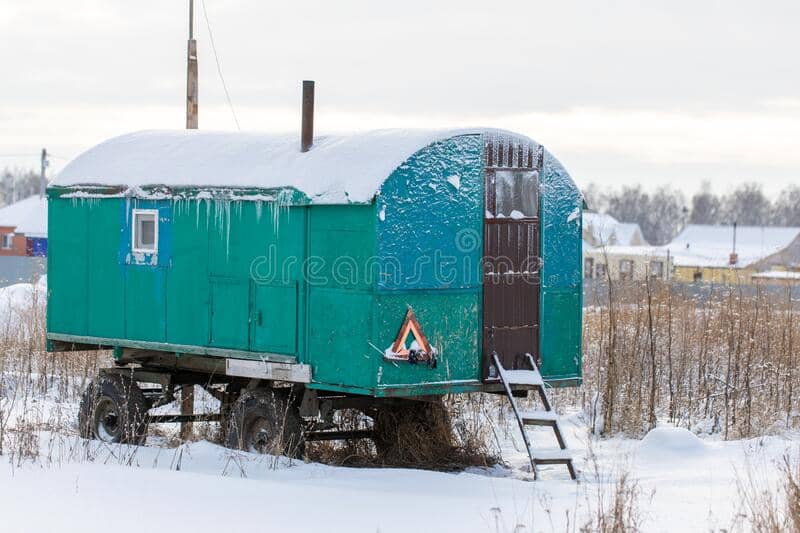 abandoned-frozen-trailer-wagon-covered-snow-outdoor-winter-day-abandoned-frozen-trailer-wagon-covered-snow-outdoor-205690911 Frozen Trailer