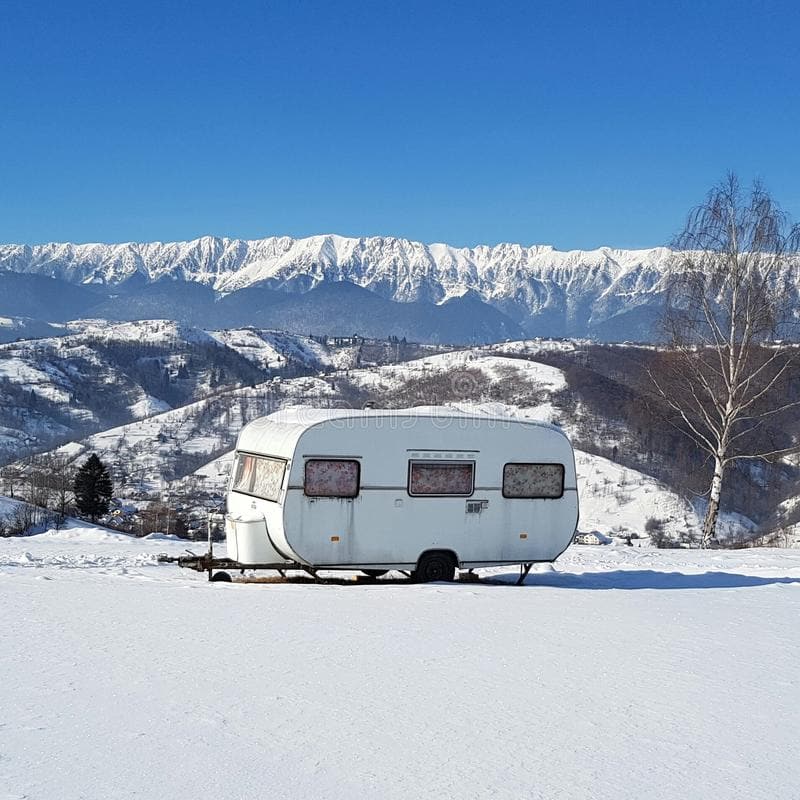 caravan-snow-white-its-curtains-closed-parked-flat-piece-land-piatra-criului-romania-sight-83712865
