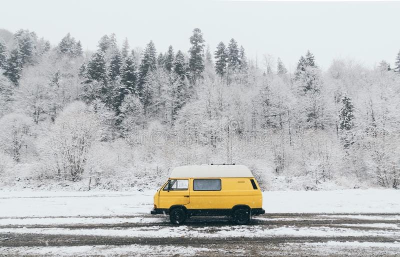 carpathians-ukraine-december-yellow-camper-van-winter-forest-background-carpathians-ukraine-december-yellow-camper-van-168029972